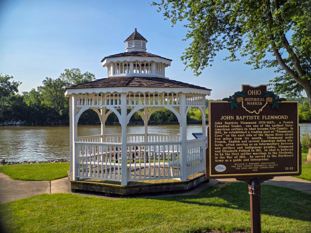 Gazebo and historic marker dedicated to Jean Baptiste Flemmond along the Huron River boardwalk in Huron, Ohio.