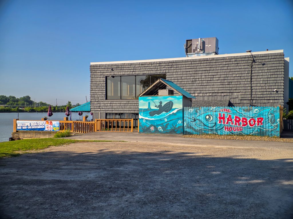 Harbor House restaurant in Huron, Ohio, with patio seating overlooking the river.