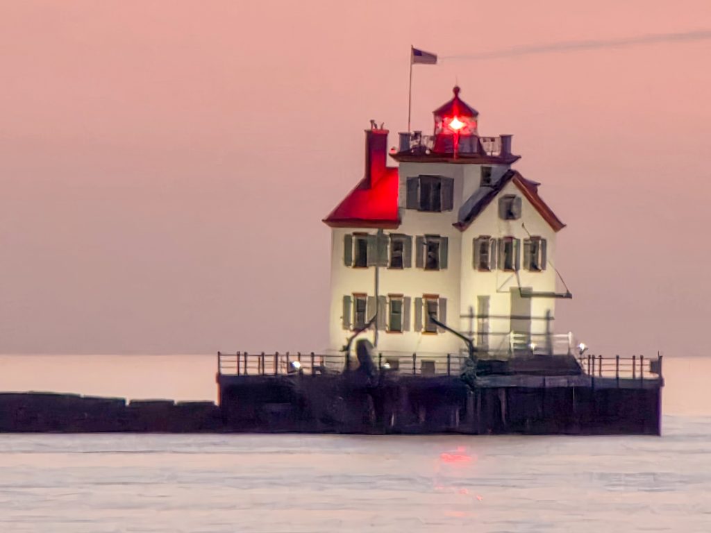Lorain Ohio Lighthouse at sunset on Lake Erie