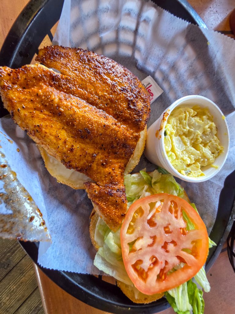 Fresh grouper sandwich served at Riverside Café