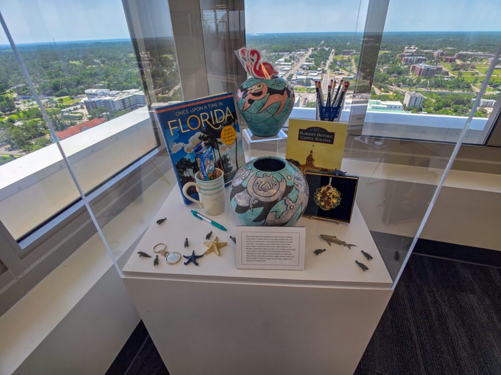 Interior view from top floor of Florida Capitol overlooking memorabilia displays