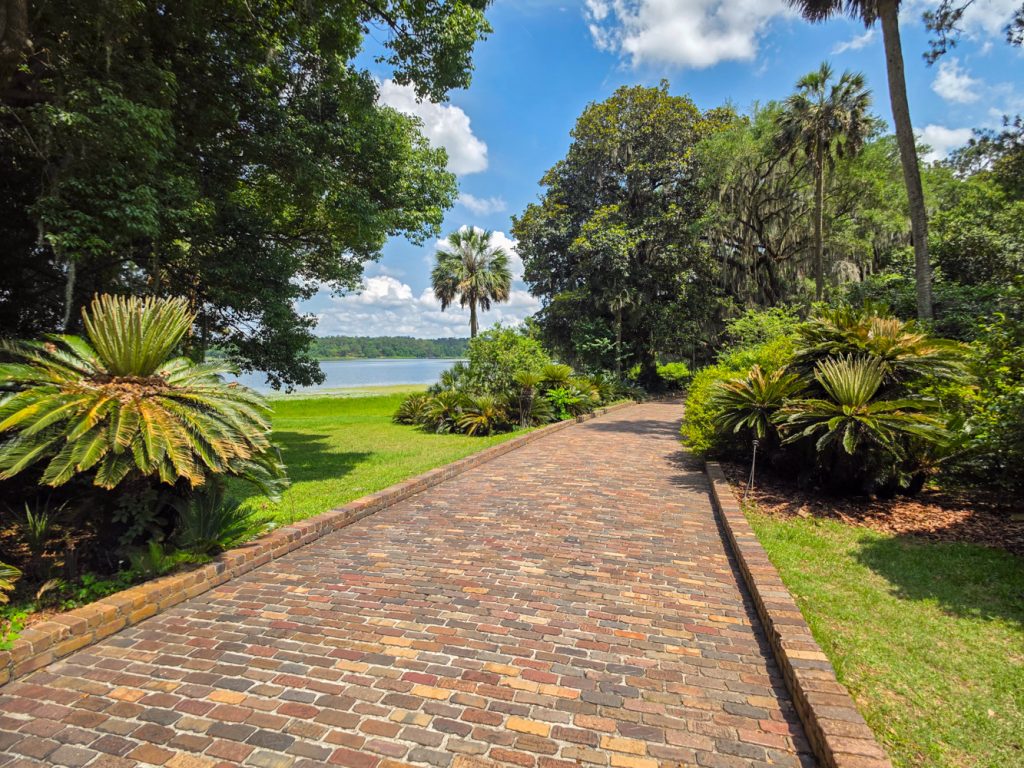 Shaded walking path winding through Maclay Gardens