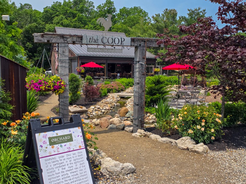 Outdoor wine tasting at The Coop at Orchard Farm Stand Catawba Island